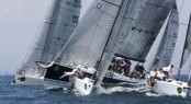 Bella Mente rounds the weather mark in a pack of Melges 32s - Photo Rolex/Dan Nerney