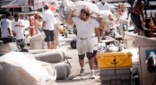 Crews carrying the sails after training - Photo Pedro Martinez - Audi MedCup - Region of Sardinia Trophy 2011