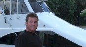 IAG Yachts recruit Dave Adams of Tricon Marine - Photo of Dave in front of Ocean 60' motor yacht