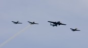 A collection of WWII aircraft performing crowd pleasing aerobatics following the 2011 Shipyard Cup - Photo by Billy Black A collection of WWII aircraft performing crowd pleasing aerobatics following the 2011 Shipyard Cup - Photo by Billy Black