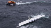 George David's Rambler 100 capsizes in the Celtic Sea- Credit- Rolex Carlo Borlenghi
