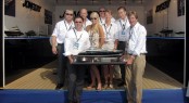 Monaco Yacht Show 2011 â Peter Versluis, director of the VeKa Group (left) and Eel Kant, director of Jongert Shipyard, with the model of MY 44 Jongert yacht and the Jongert team - Photo courtesy of Jongert Shipyard