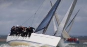 Peter Rutter and his Trustmarque Quokka yacht´s crew Photo by P. Wyeth/pwpictures