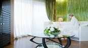 Quinta Essentia Yacht's Circular television lounge with spectacular view and sea grass panelling designed by Michela Reverberi