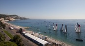 Extreme Sailing Series fleet racing only a few meters from the beach in Nice Credit Lloyd Images