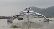 The bow view of the luxury trimaran yachat Adasta afloat