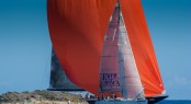 Sailing yacht Water World vs Superyacht Dragon around  Jaguar Island &Acirc;&copy; Christophe Jouany
