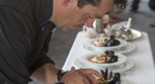Chef Jean Paul of the 150-foot motor yacht Encore took third place in the Grande Class with his dish that consisted of poached scallop and egg and steamed mussel. Photo Credit: Billy Black
