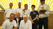 Roger Thompson, J.P. Morgan Asset Management (left) with the winning crew of &acirc;��Manroland Sheetfed&acirc;�� and Tony Langley holding the Gold Roman Bowl, presented by Dame Ellen MacArthur at today&acirc;��s prizegiving at the Island Sailing Club in Cowes. Photo: Patrick Eden