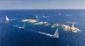 The Swan fleet attack a challenging coastal course around the islands of the Maddalena Archipelago - Photo by RolexCarlo Borlenghi