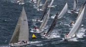 Fleet leaving Sydney Harbour after start of 68th Rolex Sydney Hobart - Photo by Rolex - Carlo Borlenghi