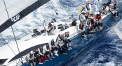 Mike Slade at the helm of his Farr 100, ICAP Leopard  Credit: Ocean Images/Richard Langdon