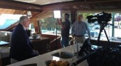 Hargrave CEO Mike Joyce gets ready for his interview aboard the 125' Hargrave RPH Yacht Gigi II