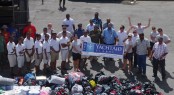The YachtAid Global Team delivering aid to Fiji after damage/destruction from Cyclone Evan in December 2012 (Photo Courtesy of YachtAid Global)