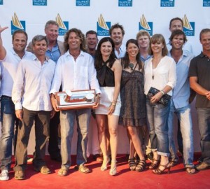 Maria Cattiva superyacht's crew taking over the Superyacht Cup Palma 2012 Trophy Photo Credit Claire Matches