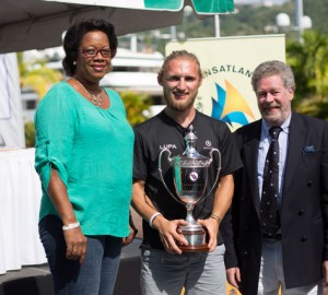 Winner of the RORC Transatlantic Race - Lupa of London, Baltic 78. Fred Pilkington collects a hoard of trophies © RORC/Arthur Daniel & Orlando K Romain