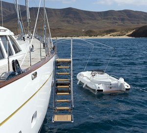 Ship's Tender Alongside On Yacht ETHEREAL