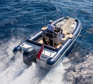 Aft Aspect Of Ship's Tender: Yacht LEANDER G's Cruising Photograph