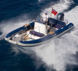 Forward Aspect Of Ship's Tender: Yacht LEANDER G's Cruising Captured