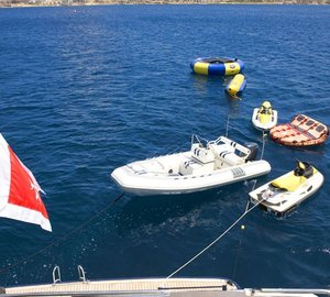 Ship's Tender With Toys On Yacht ADO