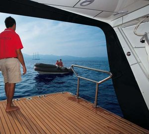 Swimming Landing With Ship's Tender Aboard Yacht HERITAGE