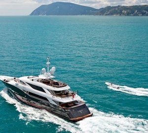 Cruising Including Ship's Tender Alongside On Board Yacht LIBERTY