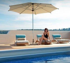Sitting By The Swimming Pool Aboard Yacht BOADICEA