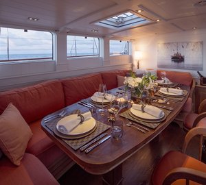 29 Royal Huisman Sailing Yacht Pumula - main deckhouse dining - Photo by Cory Silken