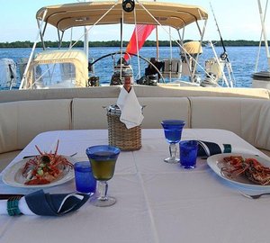 Al fresco dining aboard Aspiration yacht for charter
