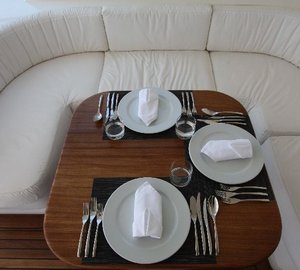 Al fresco dining on the upper deck of the MY Seven Spices - Image credit to Luxury Motor Yachts