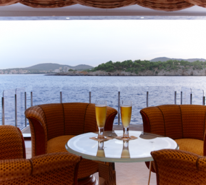 Feadship Super Yacht Lady Christine Bar area dining room with balcony folded out