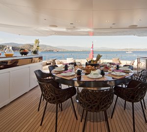 Luxury Charter Yacht MANIFIQ Upper aft deck dining