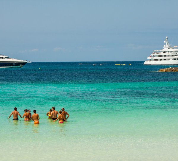 Luxury Yachts In Turquoise Beach Of Formentera