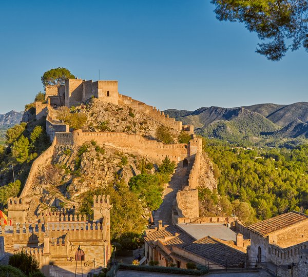 Historical Xativa Castle At Sunset, Valencia Region Of Spain