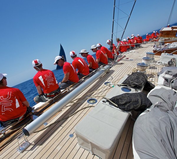 The Superyacht Cup Palma Yacht Crew Sitting In Line