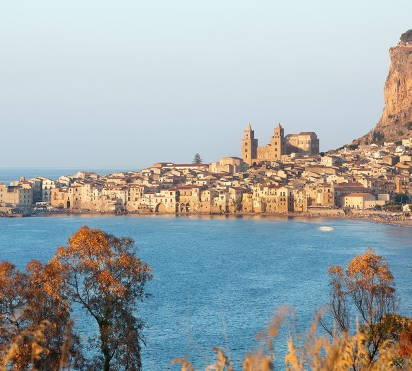 The Coastal City Of Cefalu On Sicily In Italy In The Evening