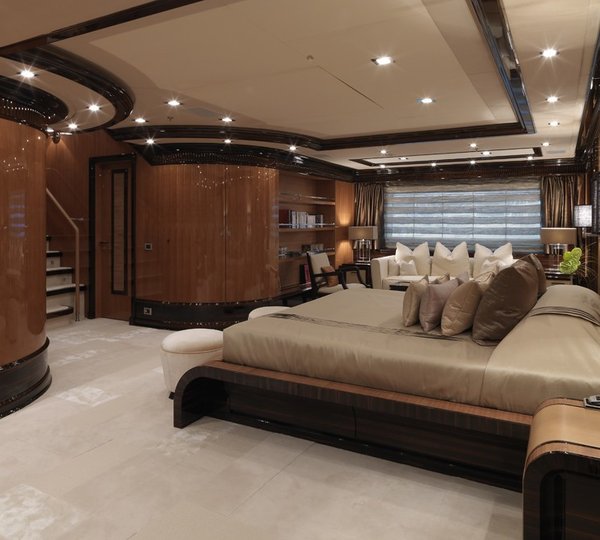 huge master suite with plush furnishings and custom-made furniture