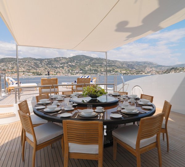 sundeck dining area with a set up for a luxury breakfast or relaxing lunch 
