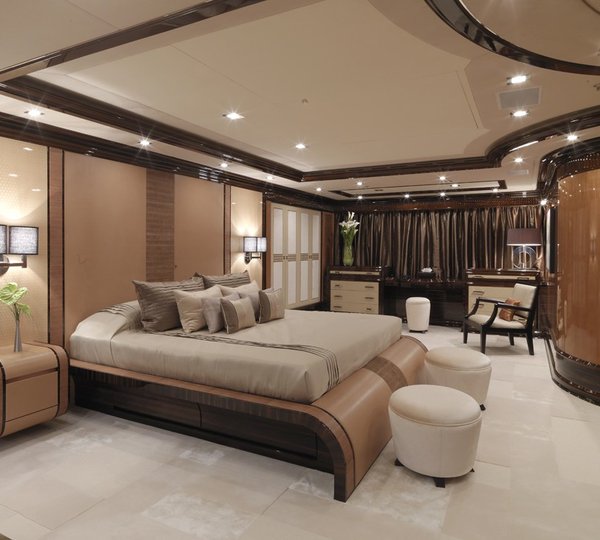 master suite with luxury amenities and office / study area