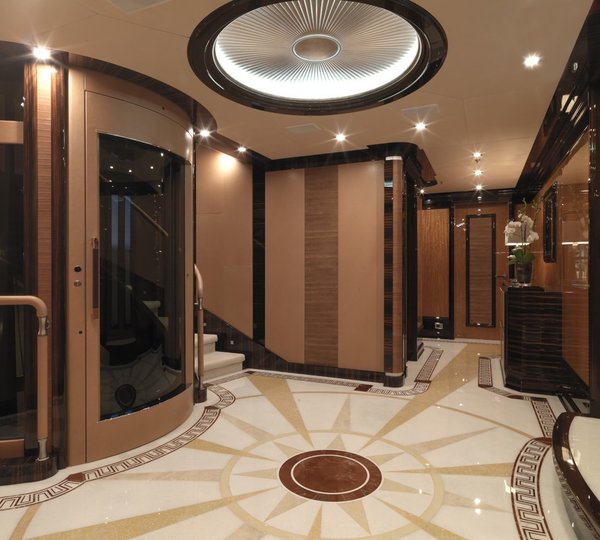 foyer entry hall with elevator and stairwell