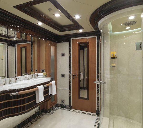 main master suite ensuite bathroom with large shower and luxurious marble details