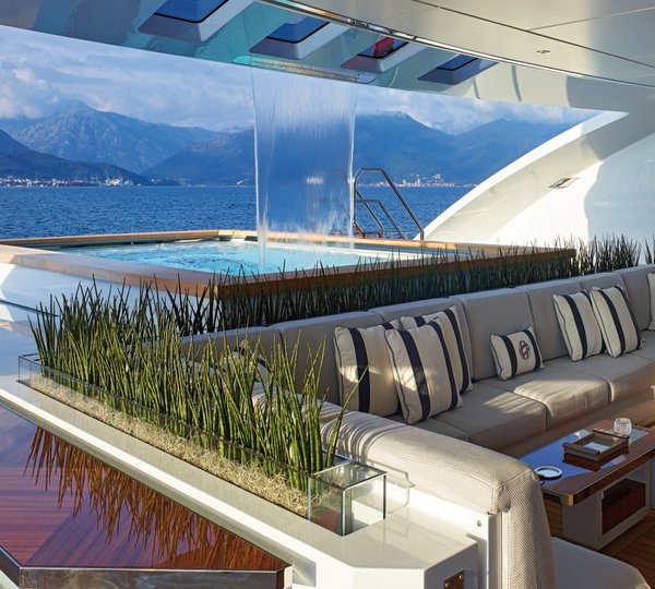 aft deck with waterfall  jet swimming pool
