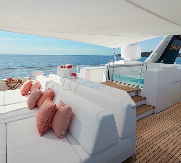 Jacuzzi and sunbathing area