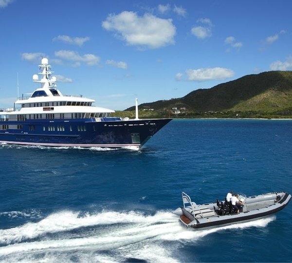 Running superyacht with tender
