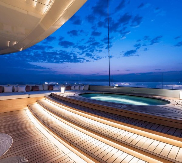 Jacuzzi pool by night on the sun deck