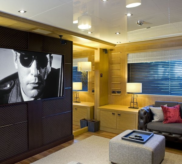 lounge with a large tv screen
