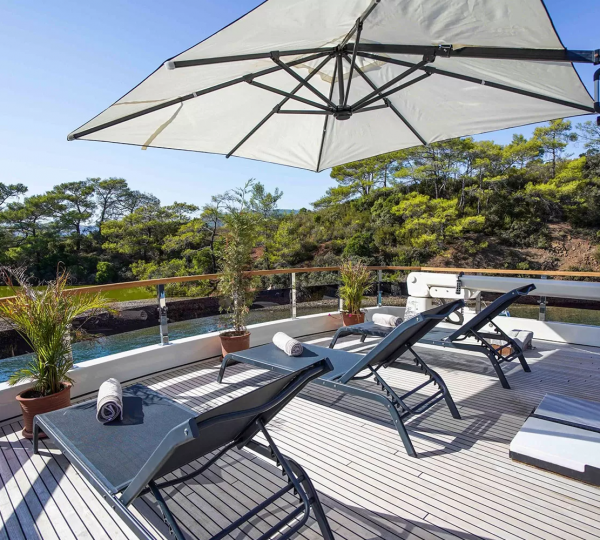 Shaded upper deck sun loungers