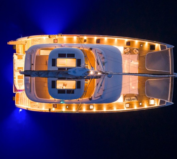 Aerial View At Night With Deck And Water Lights