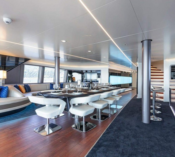 Main salon including bespoke sofas and dining table