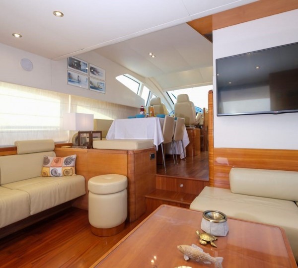 Main salon view forward to dining and helm